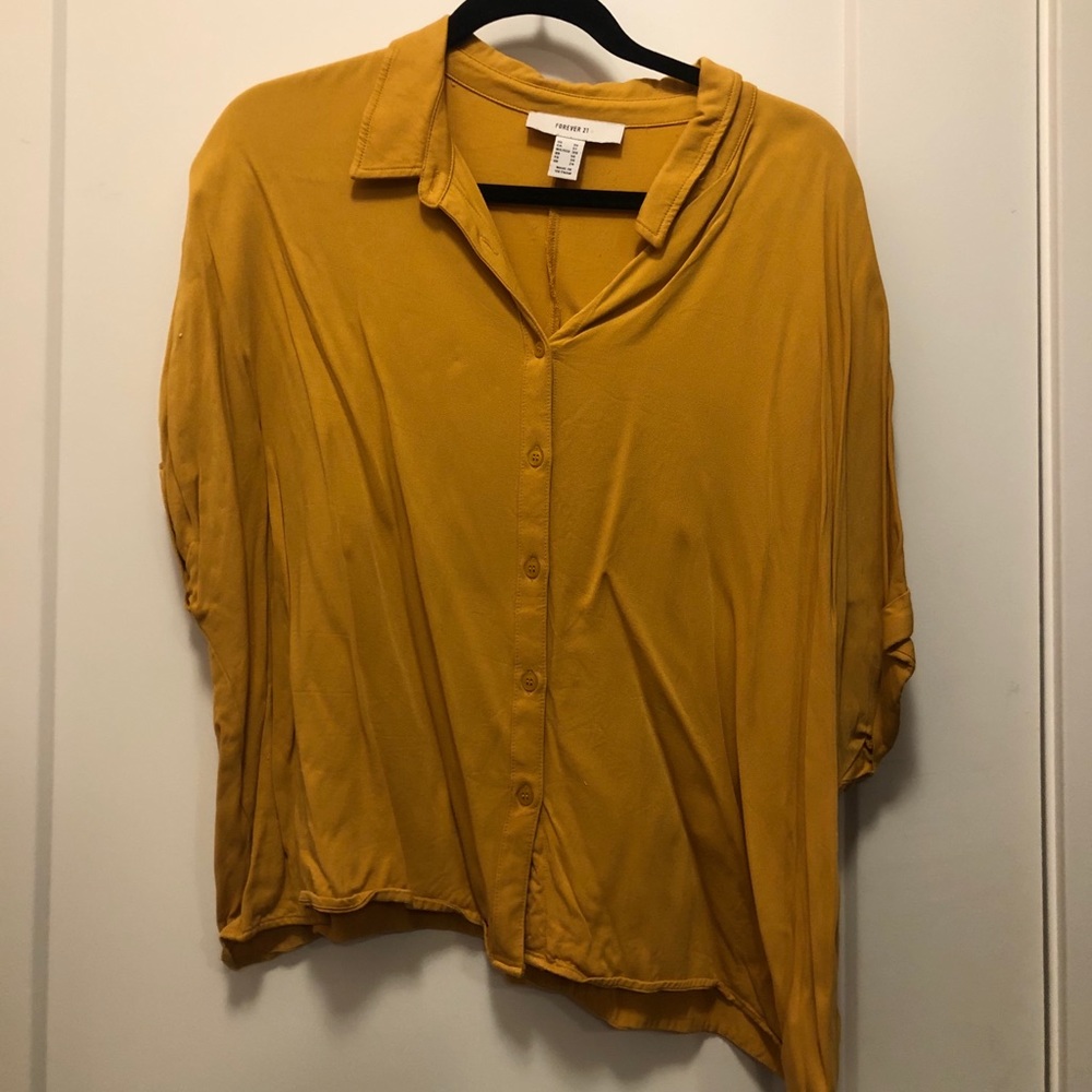 Yellow button down shirt